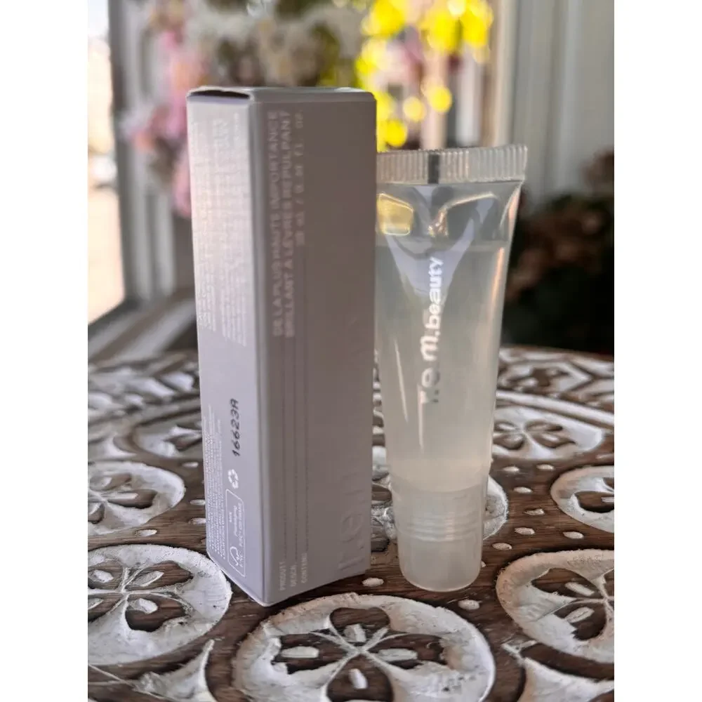 r.e.m. beauty Utmost Importance Plumping Lip Gloss Clear 10 mL Full Size